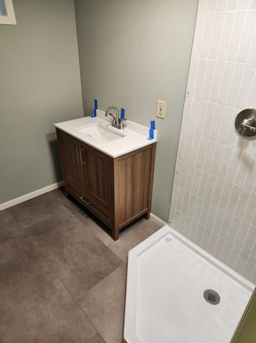 Bathroom remodel with new vanity, by New West Co
