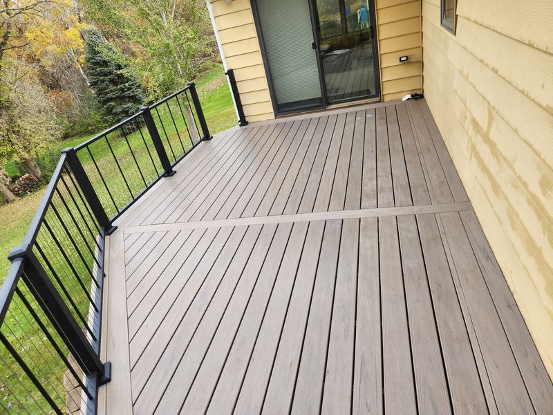 Composite deck with black aluminum railing