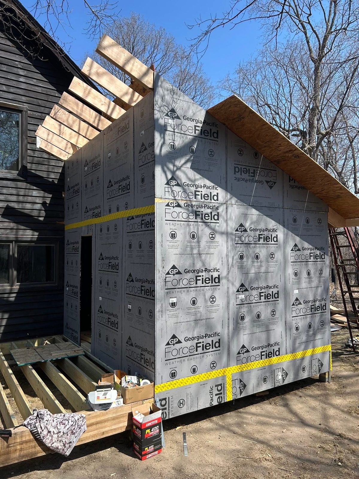 House wrap on an addition wall before siding