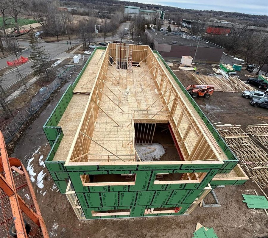 Second floor framing on a New West Co job, seen from the lift