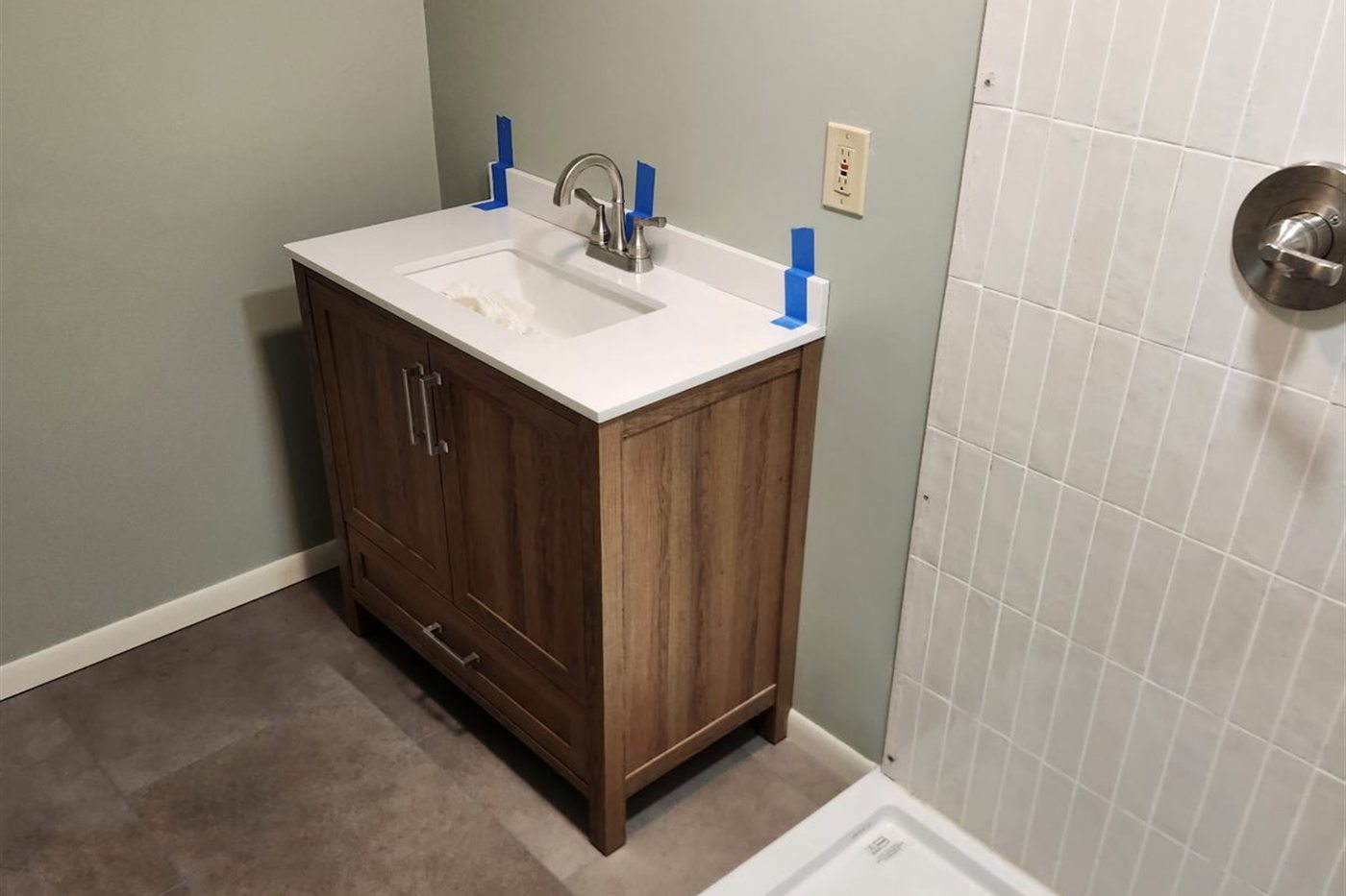Bathroom remodel with new vanity, by New West Co